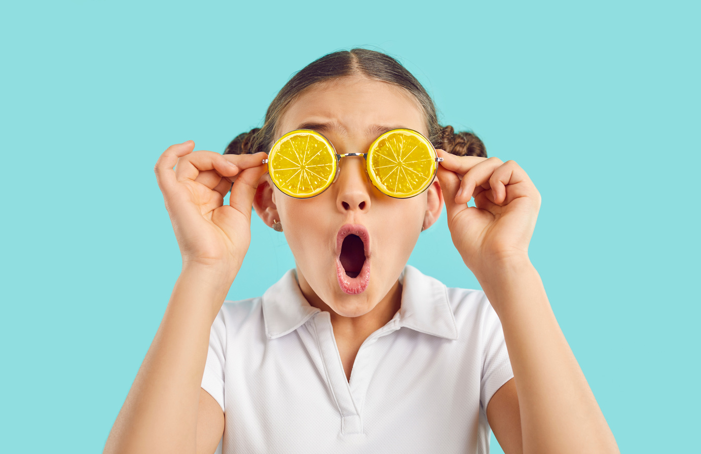 Amazed Girl Kid in Glasses Feeling Surprised