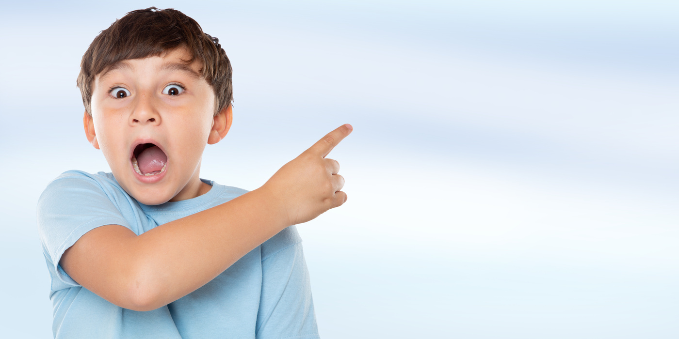 Child Kid Amazed Surprised Little Boy Pointing on Ad Advertising